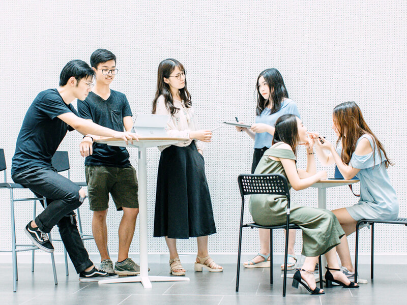 Team collaborating at VelocionTech